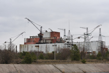 Fototapeta na wymiar Unfinished unit 5 of Chernobyl nuclear power plant at night
