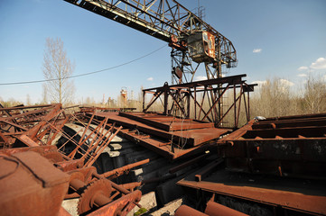 Fototapeta na wymiar Dump and gantry crane in Chernobyl
