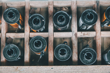 Fototapeta premium MARCH 18,2020 BANGKOK THAILAND : Some various brand of used film rolls in wood box, seems to be obsoleted since digital camera has come into market but still be favorite in some group.