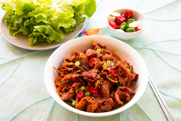 Stir fried with pork and vegetables sprinkle sesame seeds