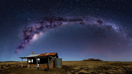 The Milky Way rises above a remote hut in Queensland's outback.