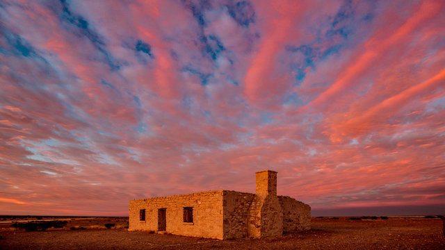 Sunrise at Carcory Ruins. This homestead 80km north of Birdsville was abandoned in the early 1900s by Sir Sydney Kidman after battling extreme drought.