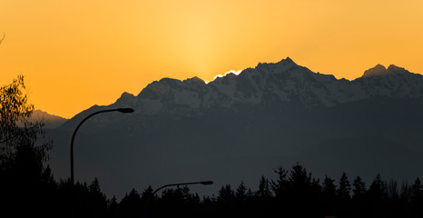 Sunset behind Olympic Mountains near Seattle