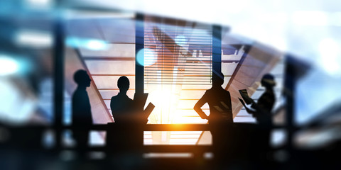 Group of business people outlines with lit background