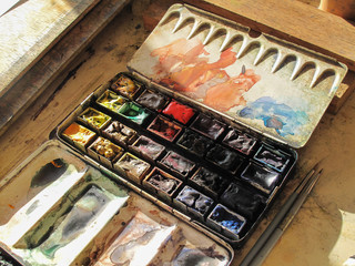 watercolors at sunset in artist studio
