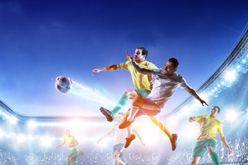 Fototapeta na wymiar Soccer players on stadium in action. Mixed media