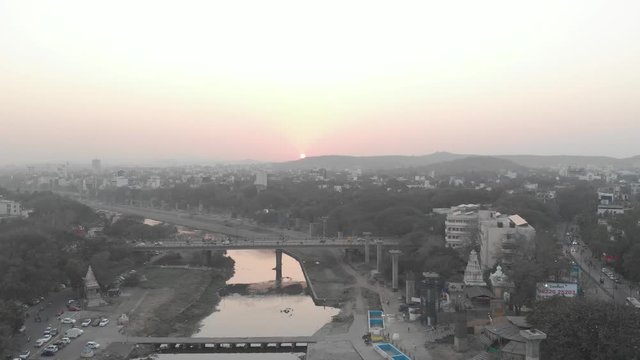 Drone shot over Pune city at sunset