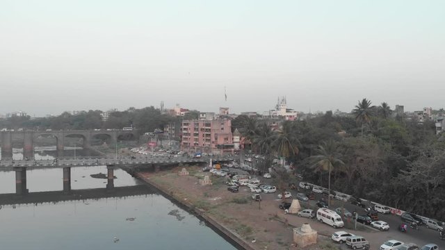 Busy Indian junction near a river aerial