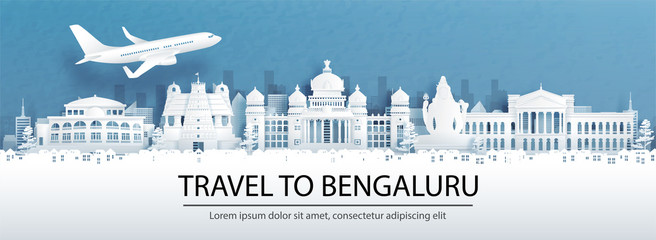 Travel advertising with travel to Bengaluru, India concept with panorama view of city skyline and world famous landmarks in paper cut style vector illustration. © ChonnieArtwork 