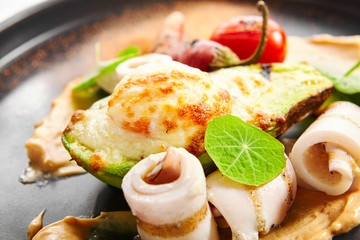 Grilled squid with avocado and egg