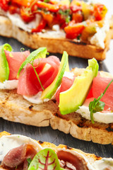 Bruschetta with tuna and avocado closeup view