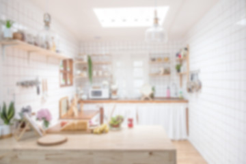 Blur background interior design for advertising, Scandinavian minimalistic classic kitchen with wooden and white details, Modern kitchen with bokeh light..