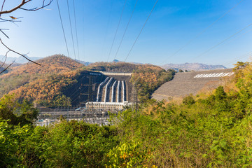 Srinakarin Dam the power station with large mountains and many trees at Kanchanaburi, Thailand. To generate electricity in the western region of the country