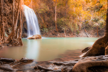 Landscape of Erawan waterfall in national park Is a waterfall in the deep forest in autumn atmosphere at Kanchanaburi, Thailand.