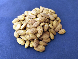 fresh healthy almonds isolated on seamless background