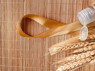 Modern and tiny cleansing silicone brush on bamboo with authentic look