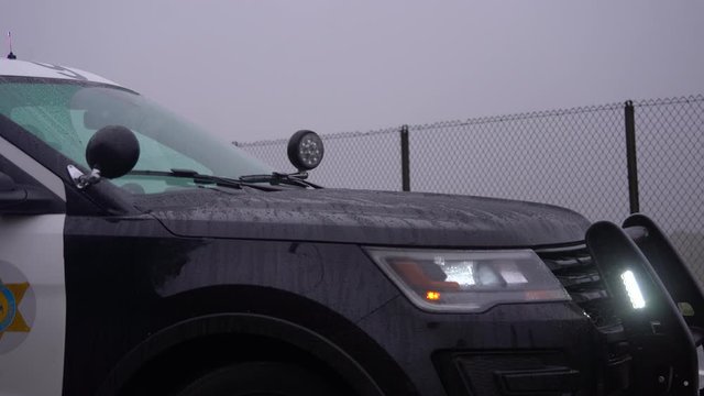 Police Car On rainy Day