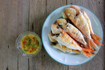 Grilled Red Snapper on the white disc ,fresh fish for food.