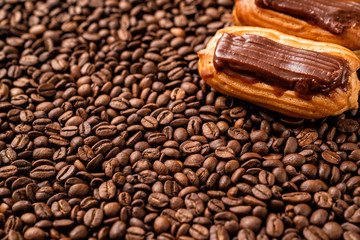 fragment cakes with chocolate icing on coffee