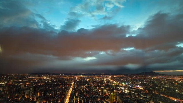 Beautiful aerial twilight to night time lapse of the Xinyi District