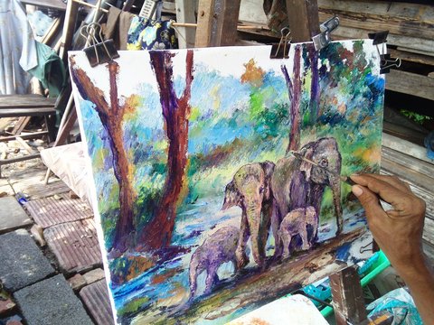 Hand drawn  Contemporary  Palette and paintbrush  Art oil painting  Elephant family  background from thailand 