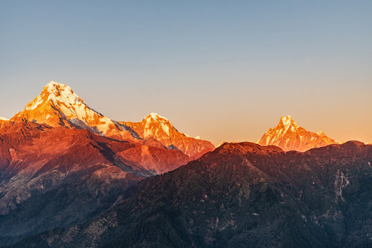 Majestic view of sunset sweeping through Annapurna South and Himchuli from Poon Hill, Ghorepani, Nepal