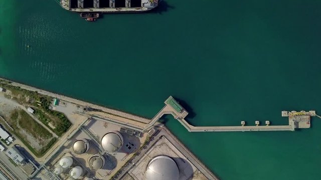 4k, Aerial footage tank farm terminal for petroleum and gasoline storage, Crude oil storage fuel petrochemical terminal, Business global oversea commercial distribution petroleum product worldwide.