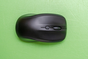 computer mouse on green background
