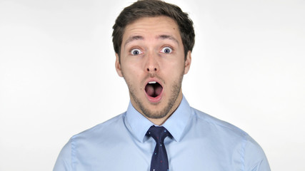 Shocked Young Businessman on White Background