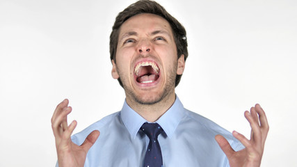 Screaming Young Businessman going Crazy on White Background