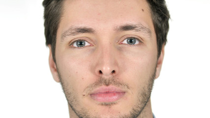 Obraz premium Close Up of Serious Young Man Face, White Background