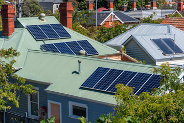 Solar panels on suburban house roofs in Melbourne, Australia