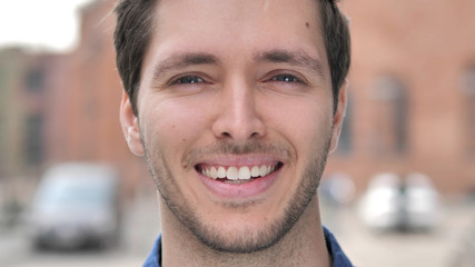 Outdoor Close up of  Smiling Young Man