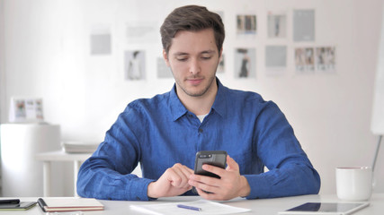 Casual Adult Man Using Smartphone, Typing Message