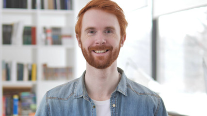 Portrait of Smiling Young Casual Redhead Man