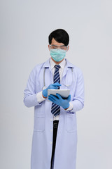 doctor physician practitioner wearing mask with tablet & stethoscope on white background. medical healthcare concept