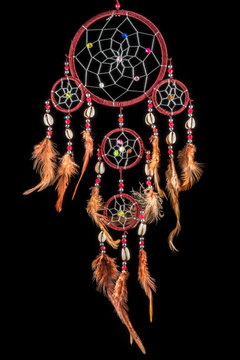 Pearl-embroidered dream catcher with colorful feathers and pearls