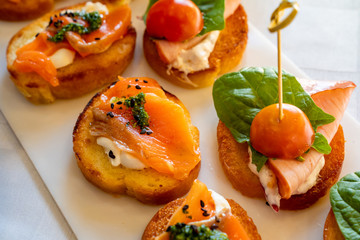 canape toast stuffed with skewers. buffet.
