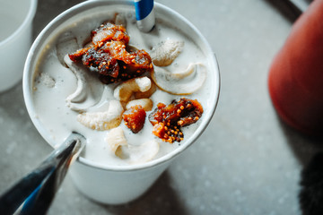 Closeup shot of milkshake in hand