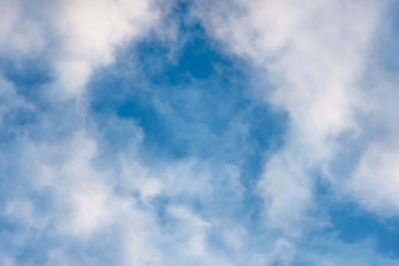  bright sky with clouds and glare from the sun's rays