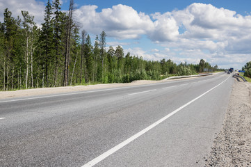 Fototapeta premium Empty highway Surgut-Kogalym in summer.