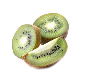 Fototapeta na wymiar Kiwi fruit with pieces isolated on a white background, close -up.