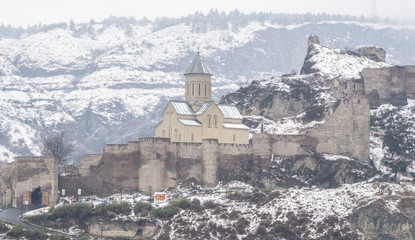 Tbilisi. Georgia country. March 2020. The old city. Salalaki District. Temple in the Narikala fortress. Suddenly in mid-March it started to snow