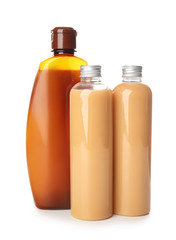Bottles of shampoo on white background
