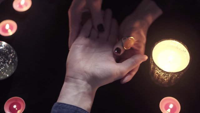 Top view of an unidentified fortune teller palmist