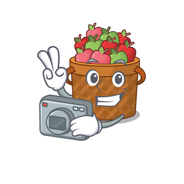apple basket mascot design as a professional photographer with a camera
