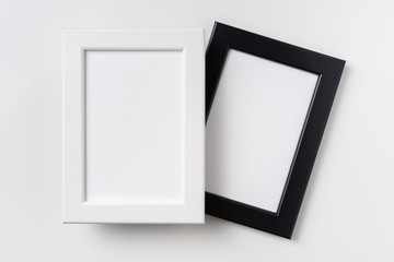 top view of two black and white wood photo frame