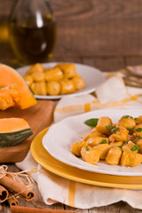 Pumpkin gnocchi with grated amaretti cookies.