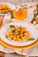 Pumpkin gnocchi with grated amaretti cookies.