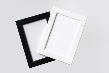 top view of two black and white photo frame on air